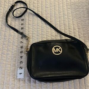 Black and gold Michael Kors crossbody